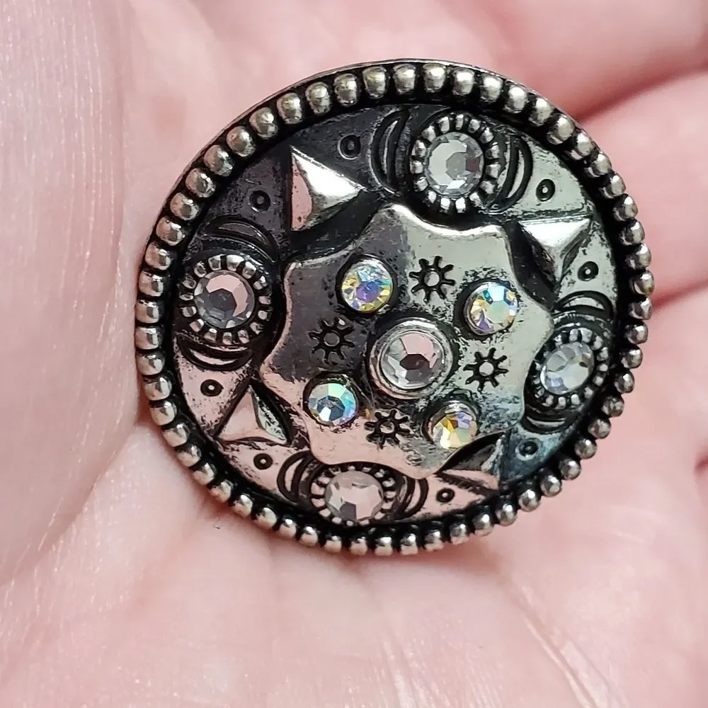 Silver tone circular sparkly ring